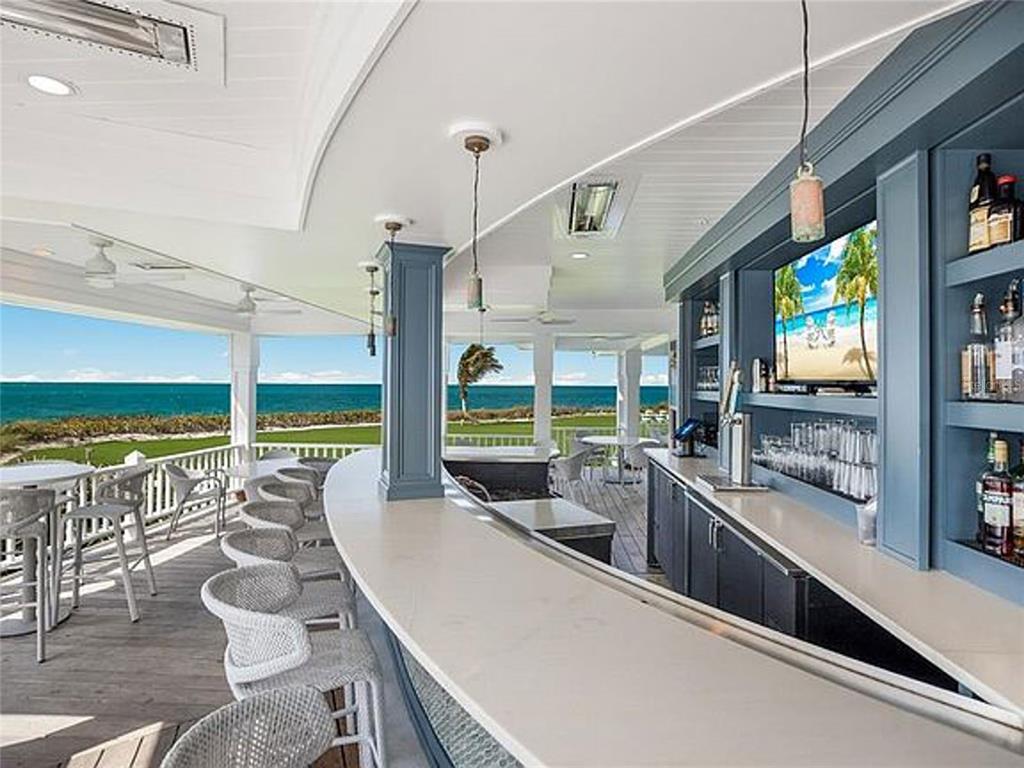 319 Pilot Point Lane Boca Grande, FL 33921 - Photo 61 of 62 a room with lots of counter and windows