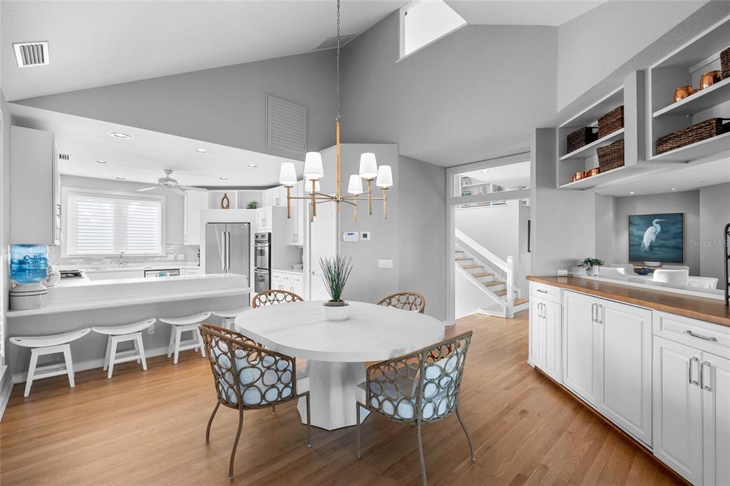 319 Pilot Point Lane Boca Grande, FL 33921 - Photo 10 of 62 a view of a dining room with furniture window and wooden floor