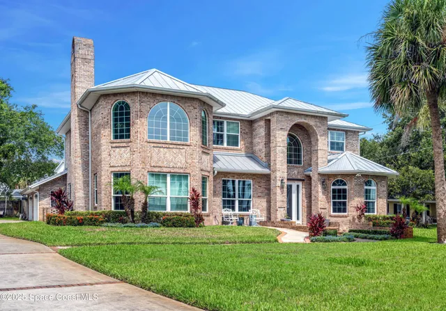 a view of a swimming pool with an outdoor seating