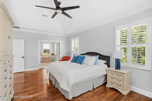 an aerial view of a house with a lake view