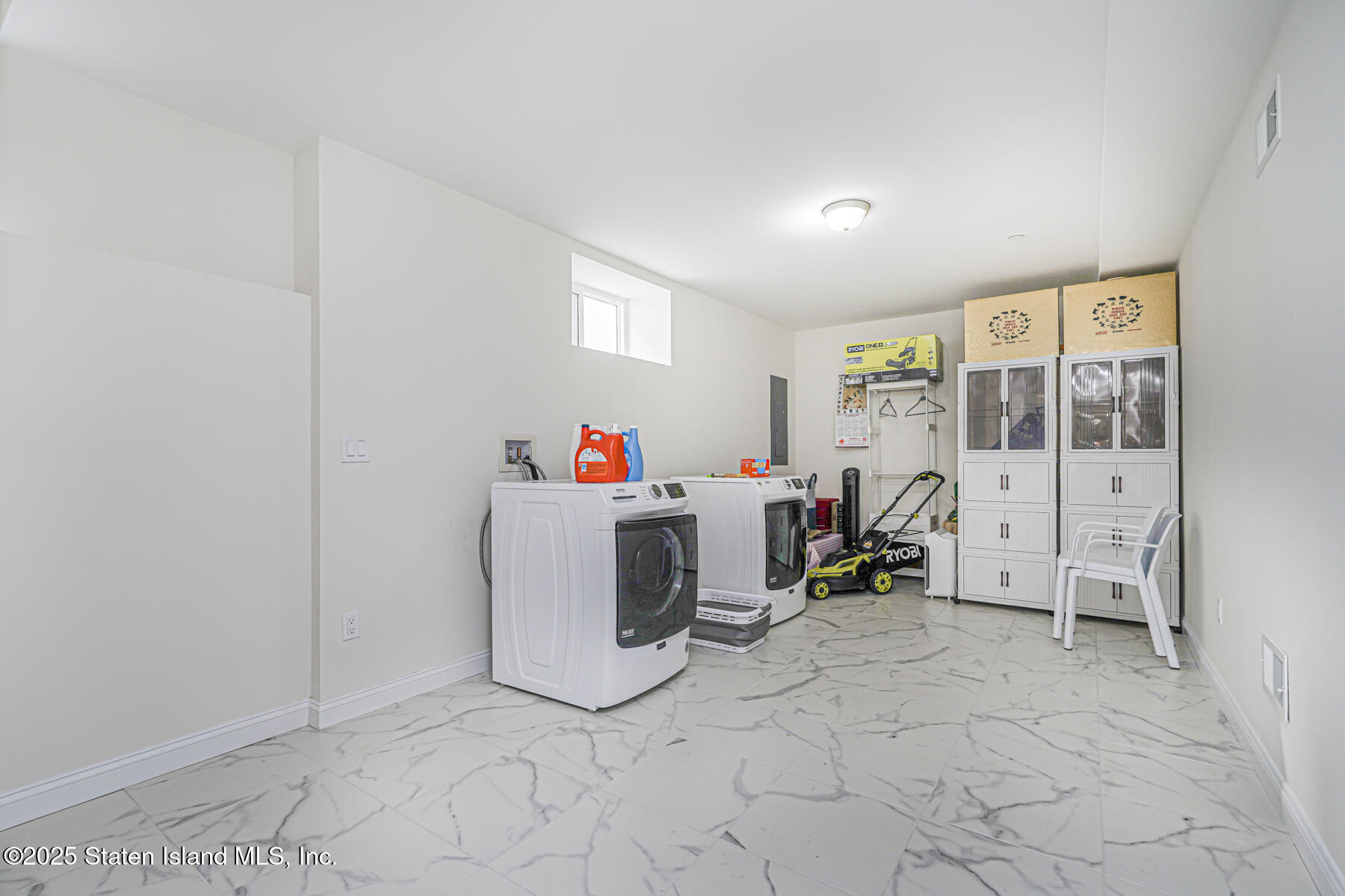 25 Ardmore Avenue Staten Island, NY 10314 - Photo 11 of 27 a view of living room with furniture and white walls