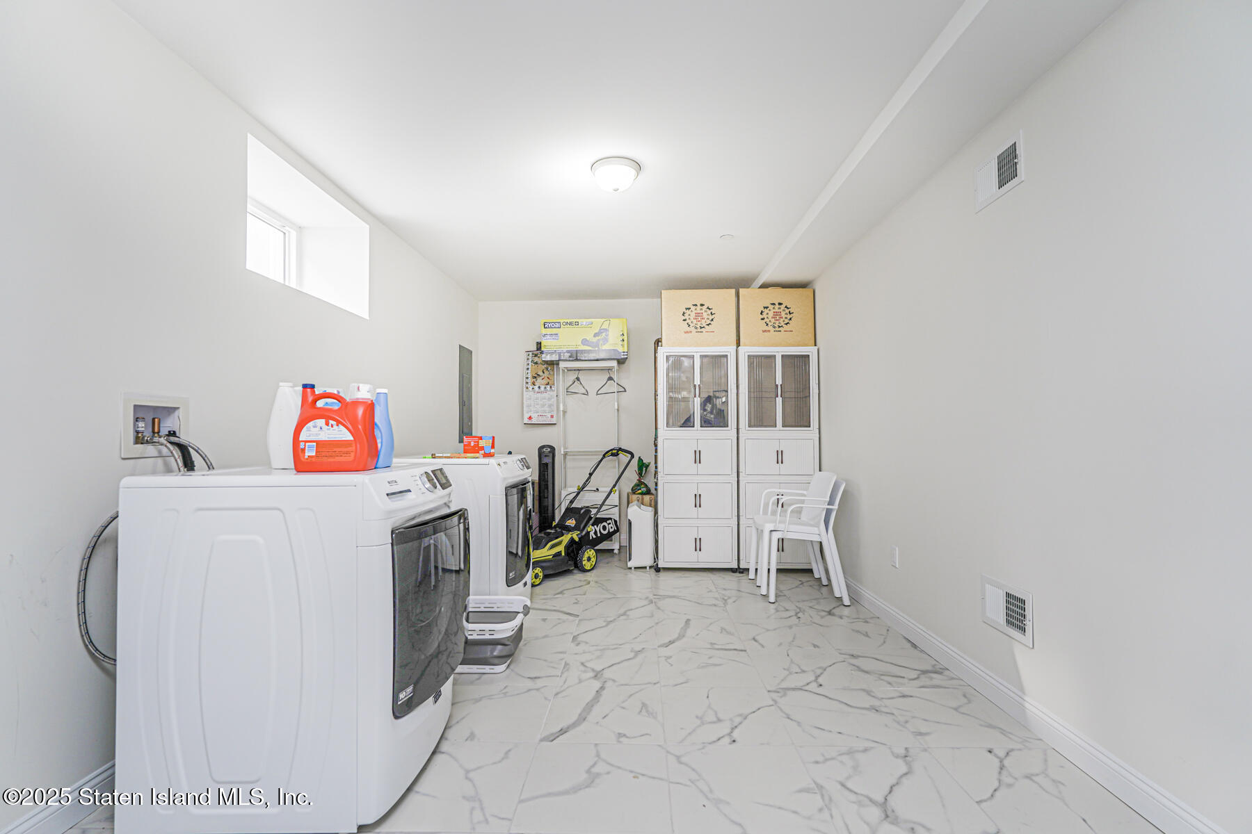 25 Ardmore Avenue Staten Island, NY 10314 - Photo 12 of 27 a utility room with dryer and washer
