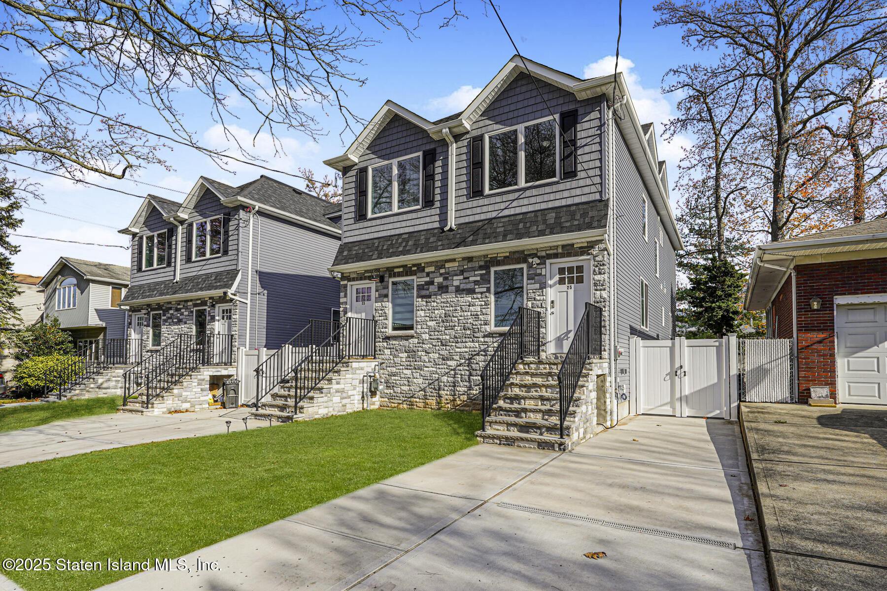 25 Ardmore Avenue Staten Island, NY 10314 - Photo 2 of 27 a front view of a house with a yard