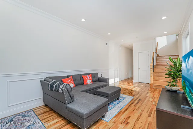 a living room with furniture and a couch