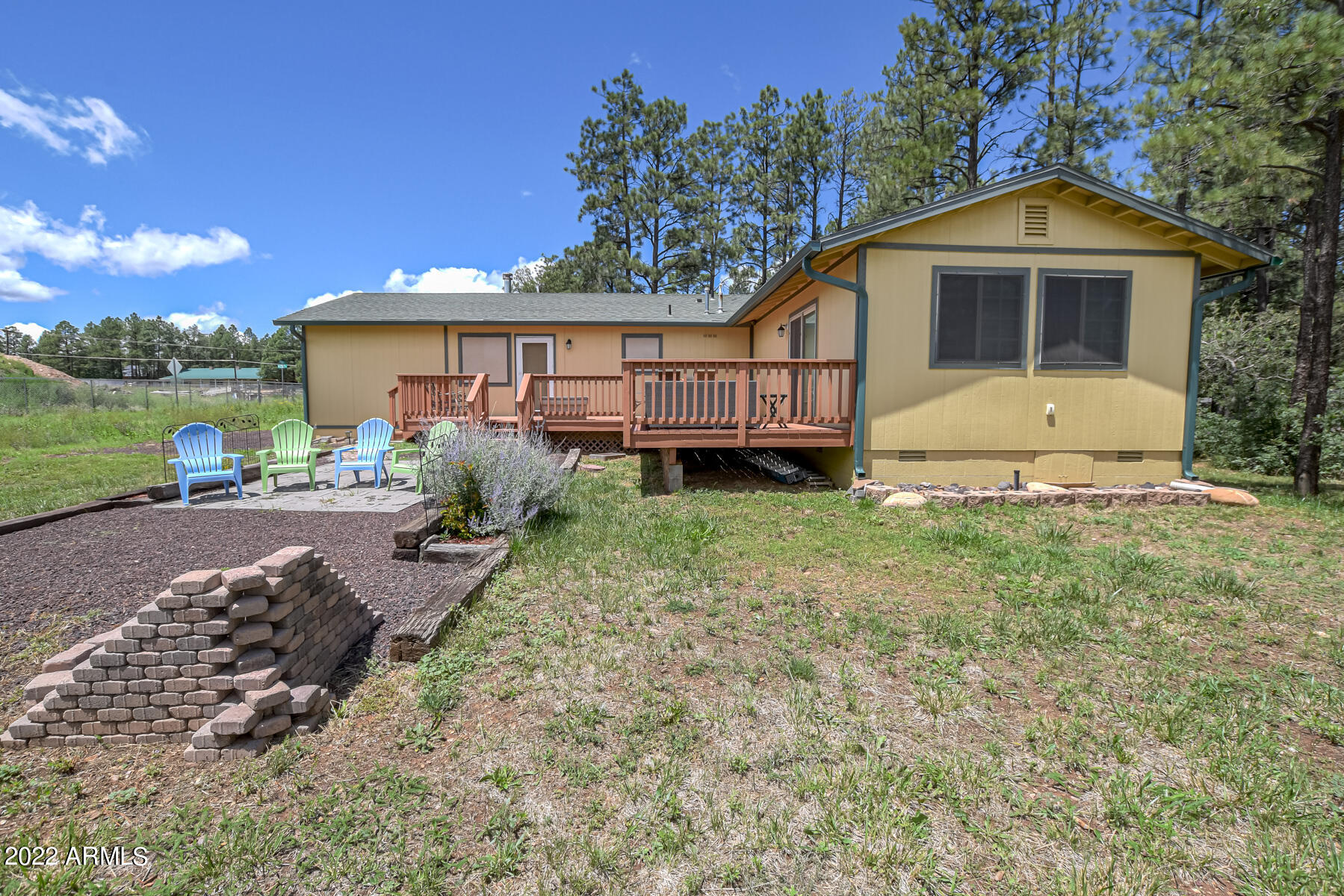 6175 Sutter Drive Lakeside, AZ 85929 - Photo 21 of 38 a front view of a house with garden