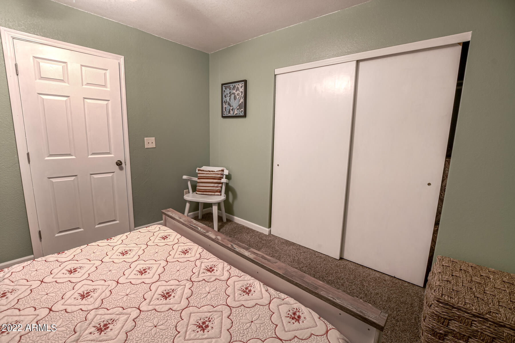 6175 Sutter Drive Lakeside, AZ 85929 - Photo 29 of 38 a bedroom with a bed and a dresser