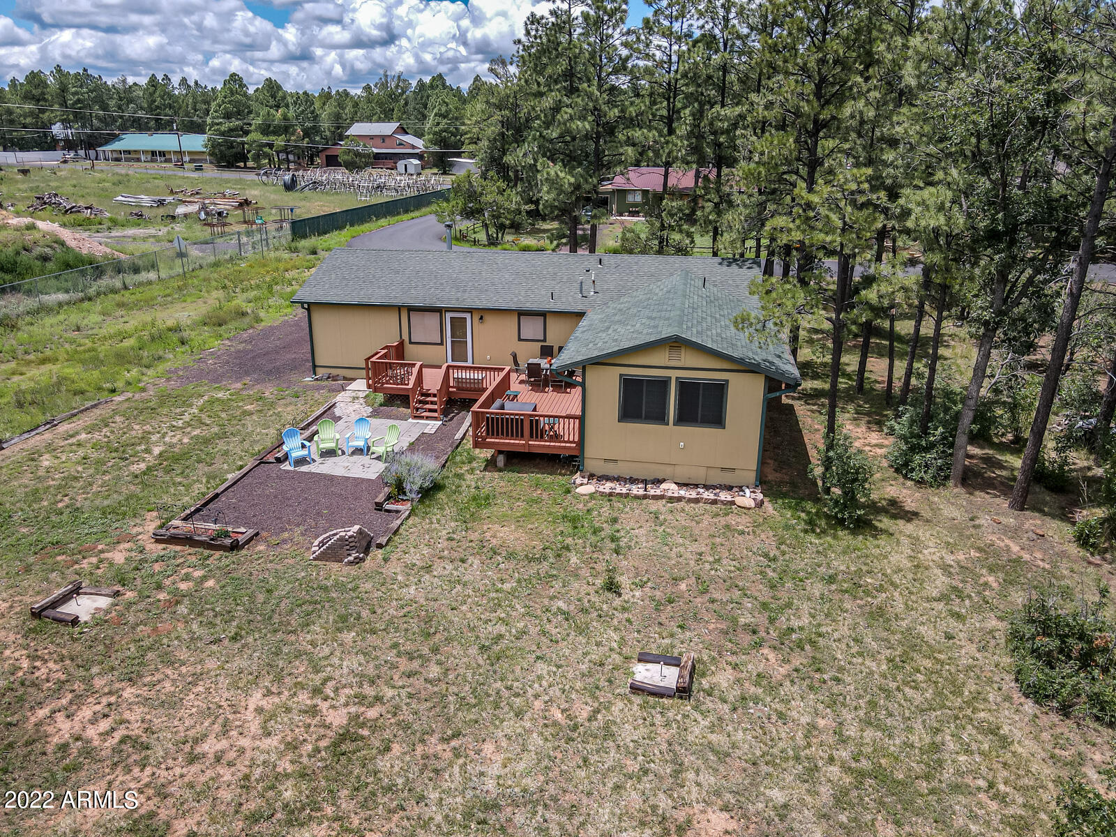 6175 Sutter Drive Lakeside, AZ 85929 - Photo 35 of 38 a view of a house with a yard