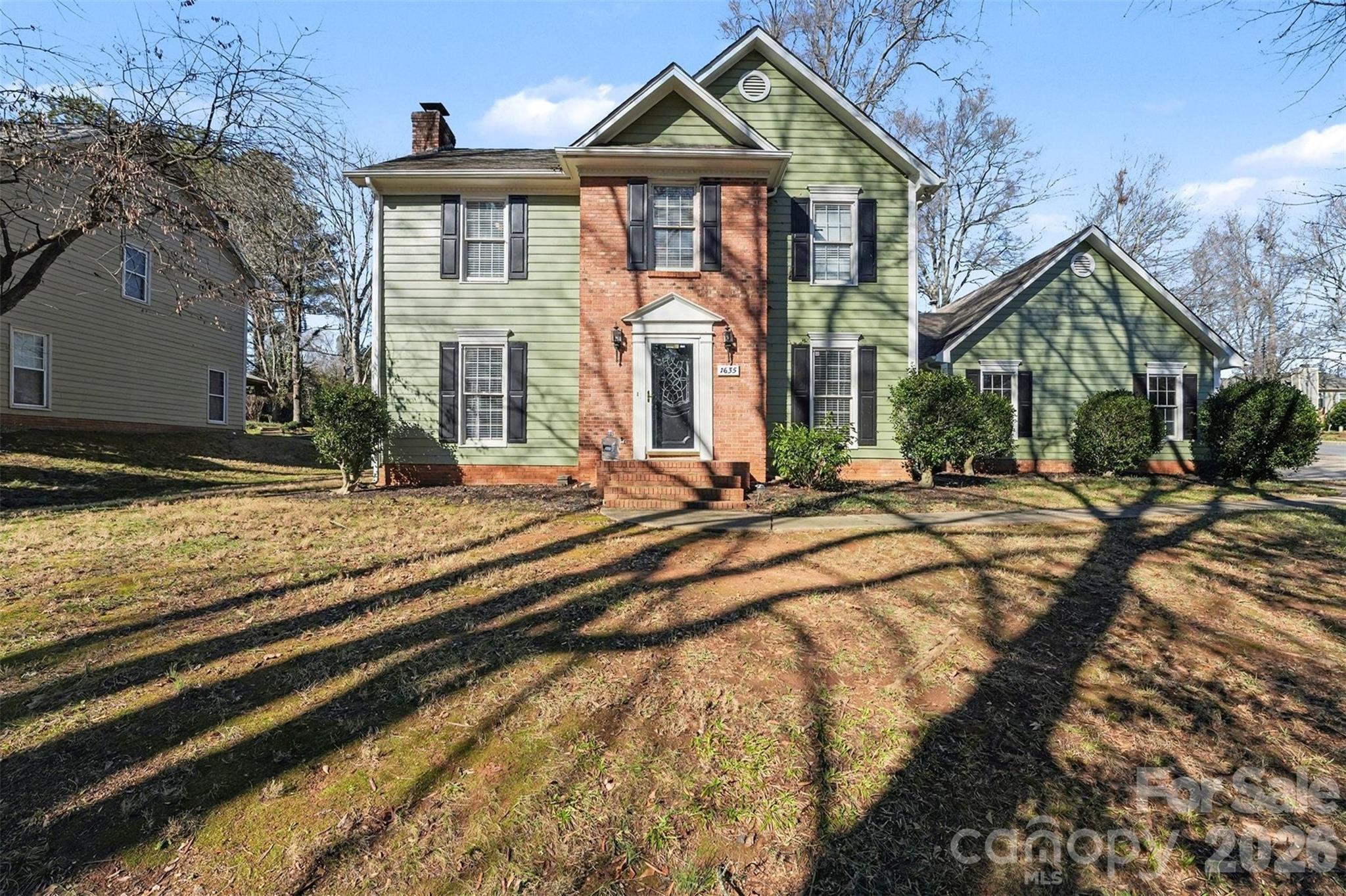 1635 Bear Mountain Road Charlotte, NC 28214 - Photo 6 of 27 a front view of a house with a yard