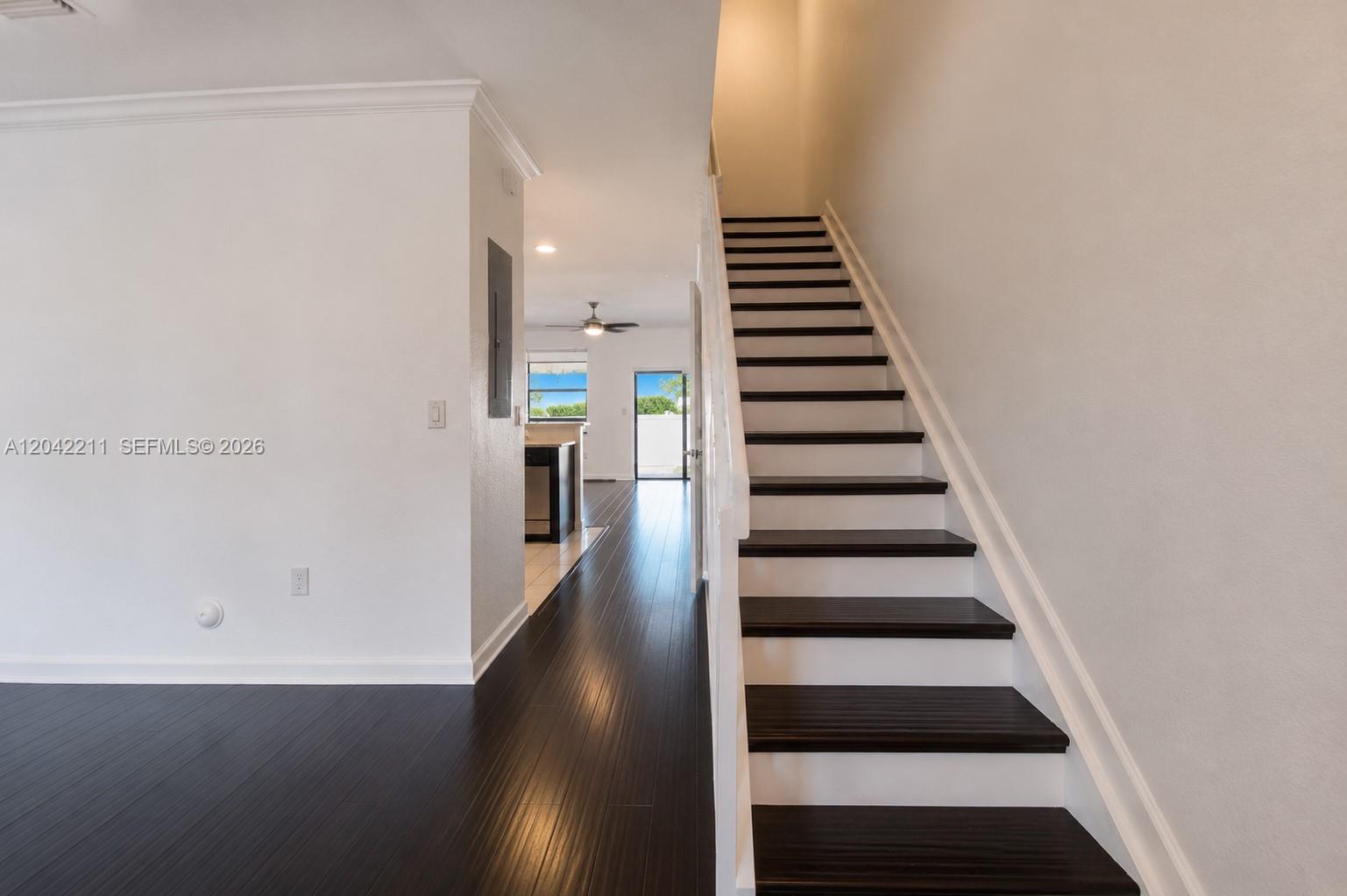 8954 West 35th Way Hialeah, FL 33018 - Photo 4 of 24 a view of entryway and hall with wooden floor