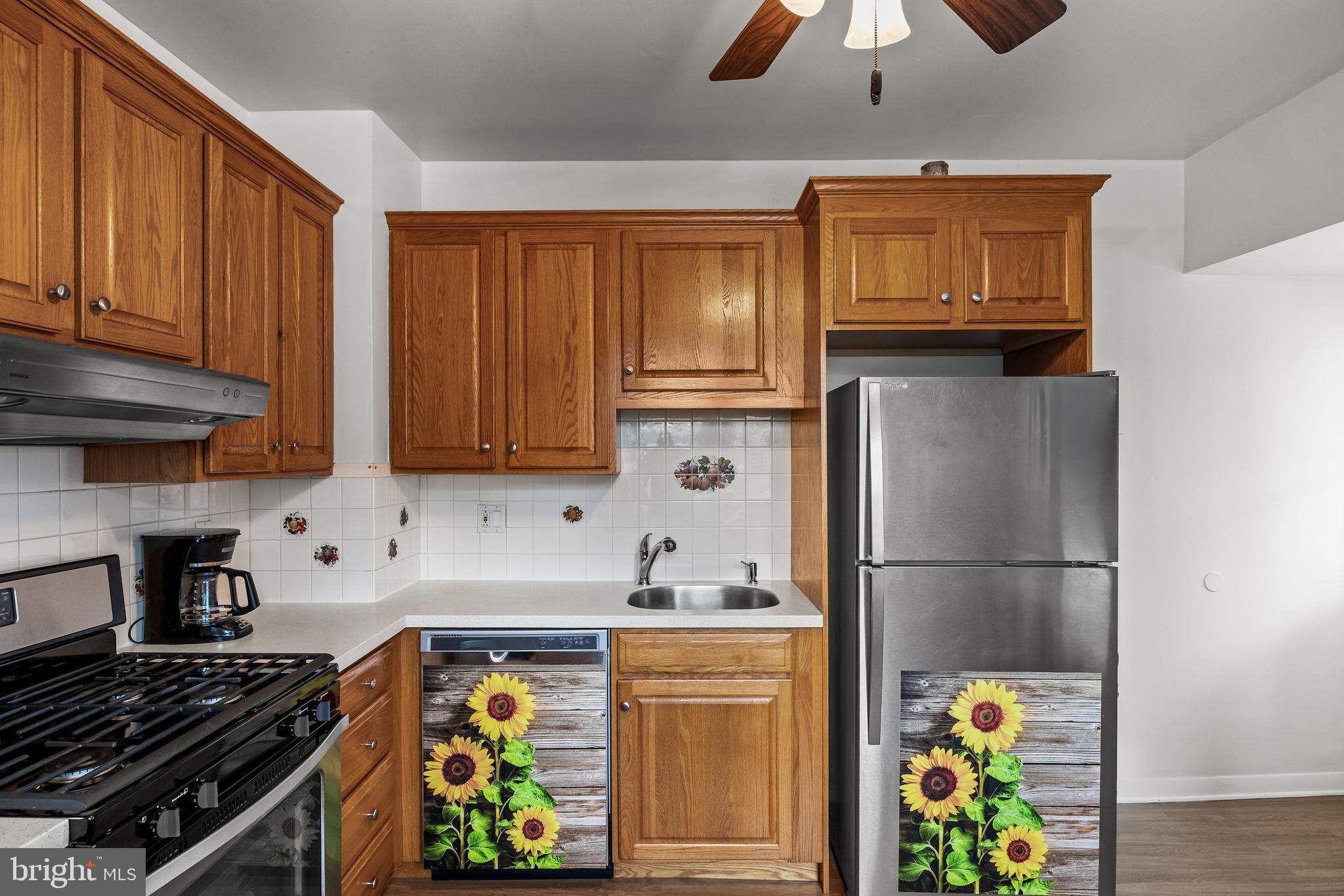 304 South Forklanding Road Maple Shade, NJ 08052 - Photo 9 of 29 a kitchen with stainless steel appliances granite countertop a refrigerator and a stove top oven