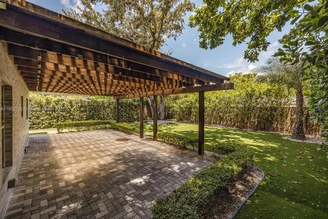 a bedroom with a bed and a table