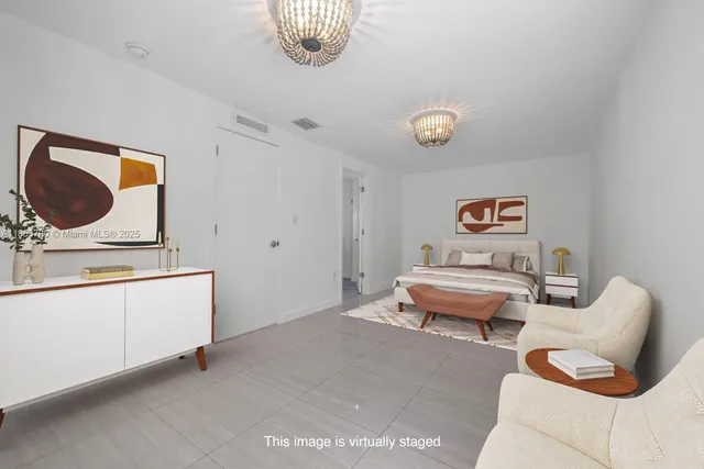a kitchen with cabinets stainless steel appliances and a window