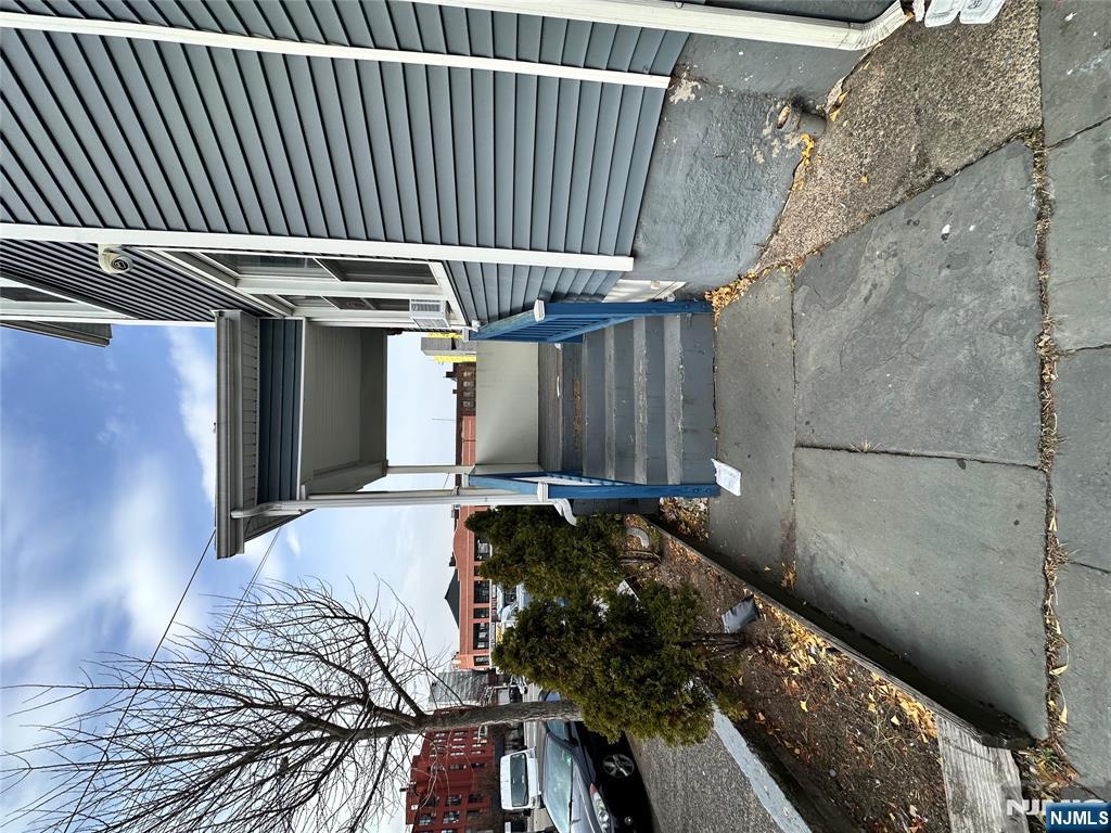 267 Ellison Street Paterson, NJ 07501 - Photo 4 of 16 a view of entryway with a yard