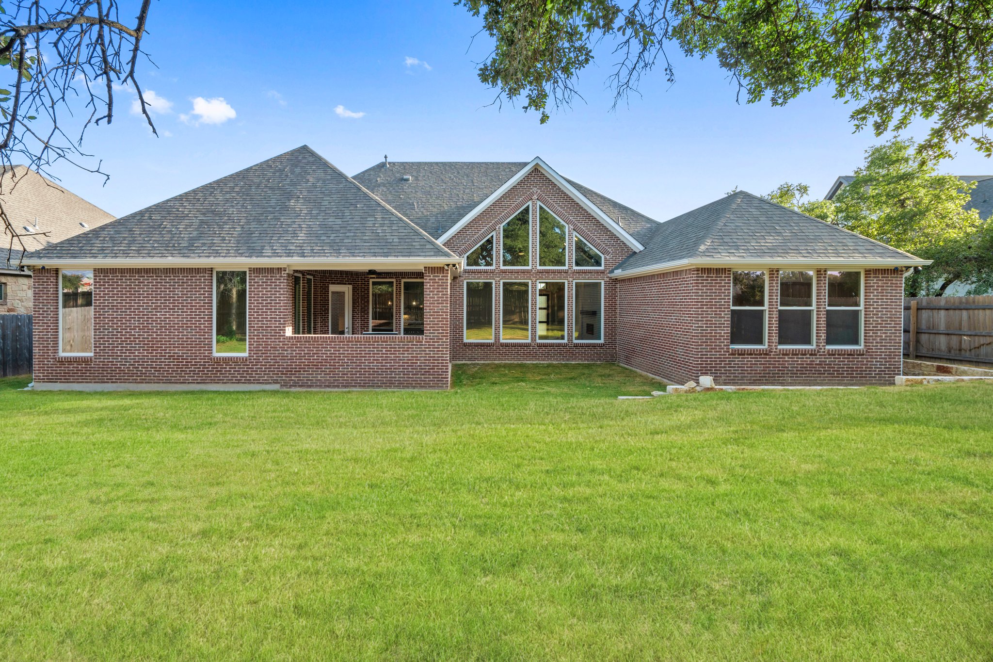 112 Axis Loop Georgetown, TX 78628 - Photo 35 of 39 a front view of a house with a garden