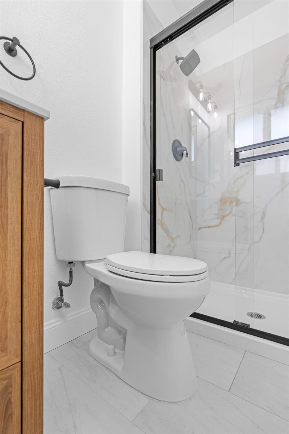 420 Bellevue Road Merced, CA 95348 - Photo 44 of 75 a bathroom with a toilet and a shower