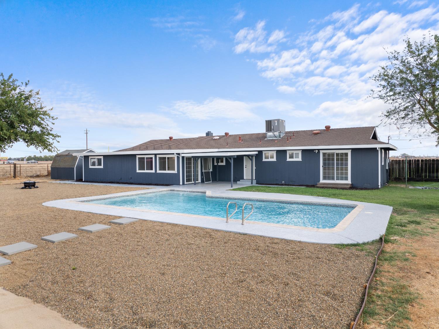 420 Bellevue Road Merced, CA 95348 - Photo 67 of 75 a view of pool with a yard in front of it