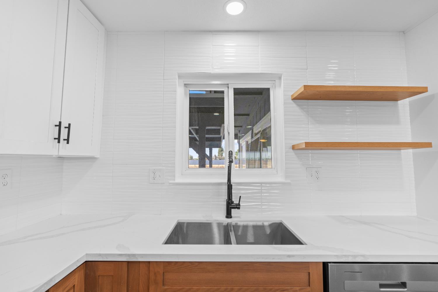 420 Bellevue Road Merced, CA 95348 - Photo 74 of 75 a kitchen with a sink and a window