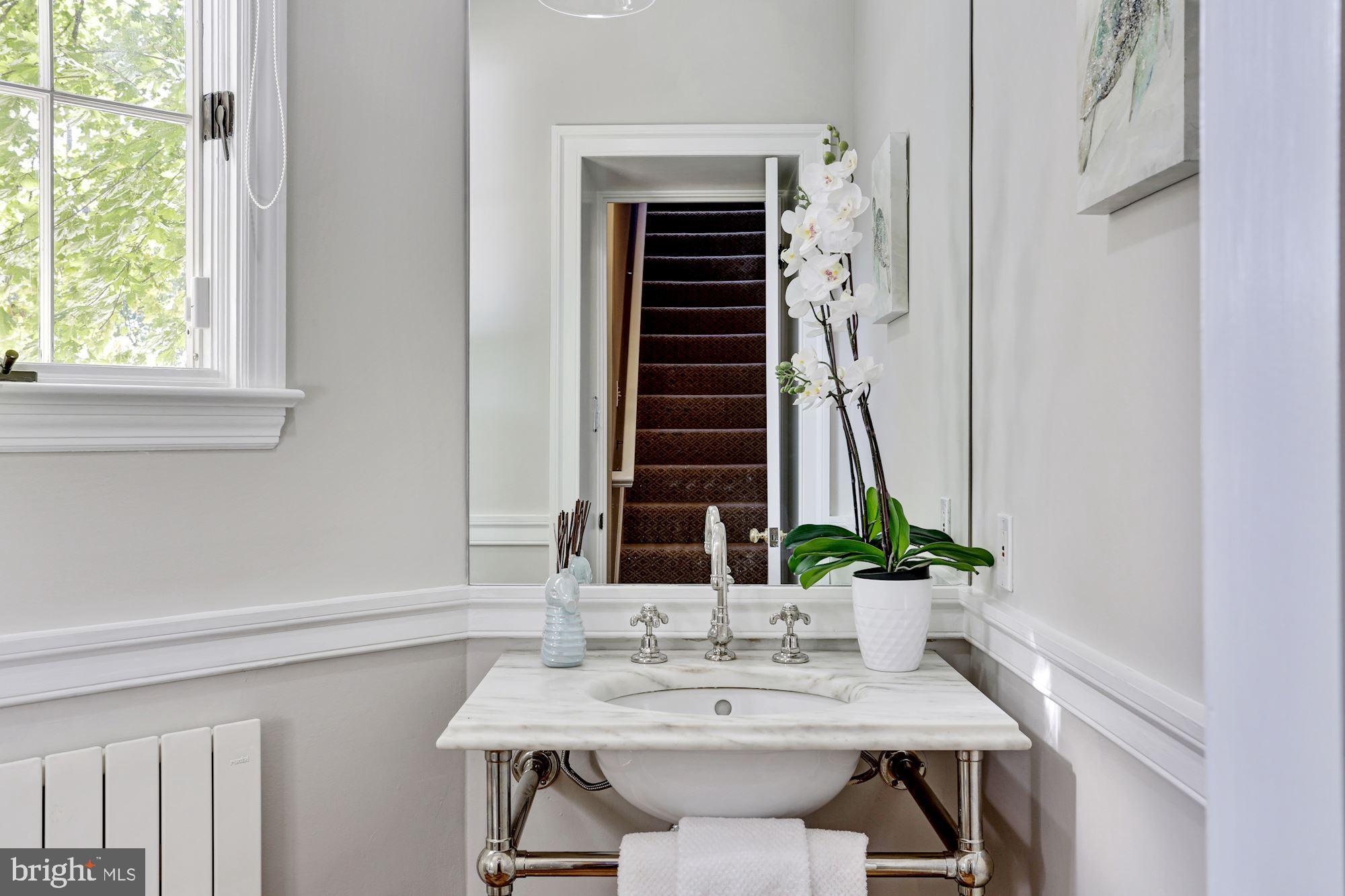 3306 R Street Northwest Washington, DC 20007 - Photo 7 of 23 Coveted half-bathroom on the main level.