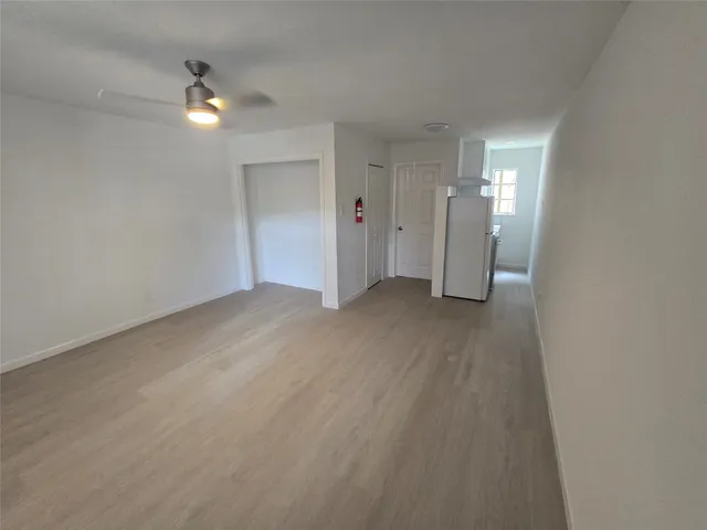 an empty room with a staircase