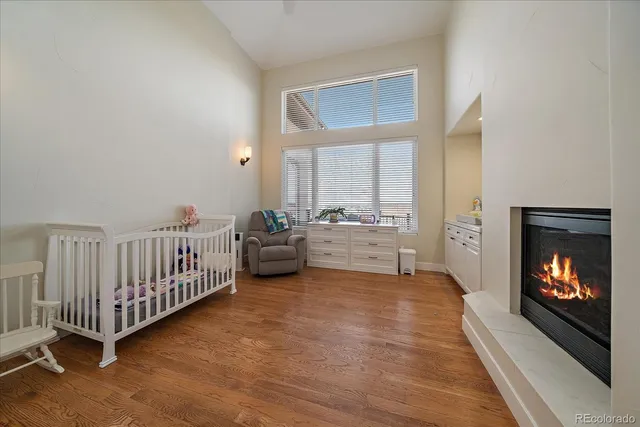 a view of a room with furniture and window fire place