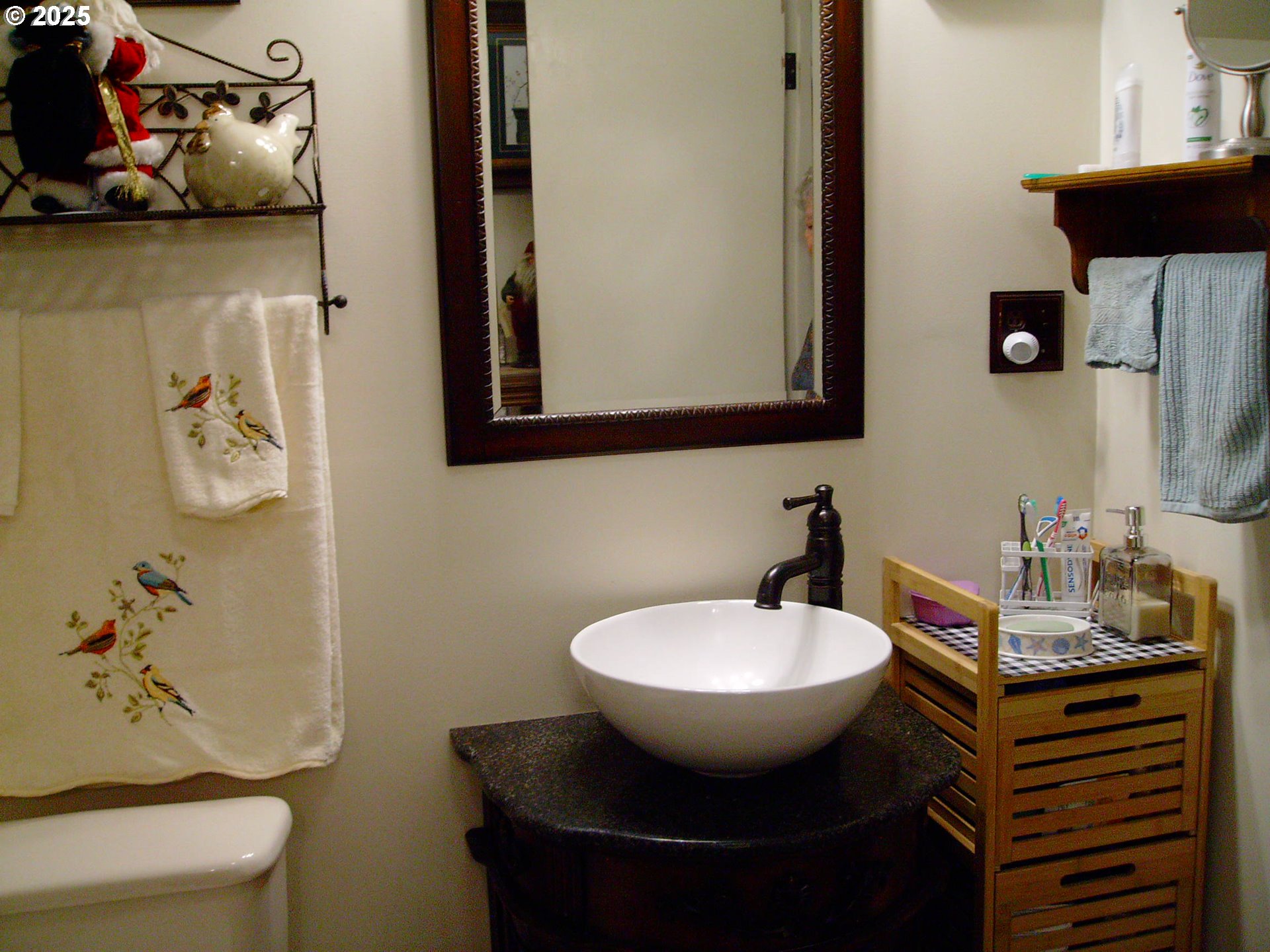 527 South Dewey Street Union, OR 97883 - Photo 12 of 21 a bathroom with a sink and a mirror