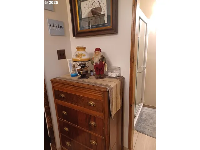 a view of dining room with furniture and wooden floor