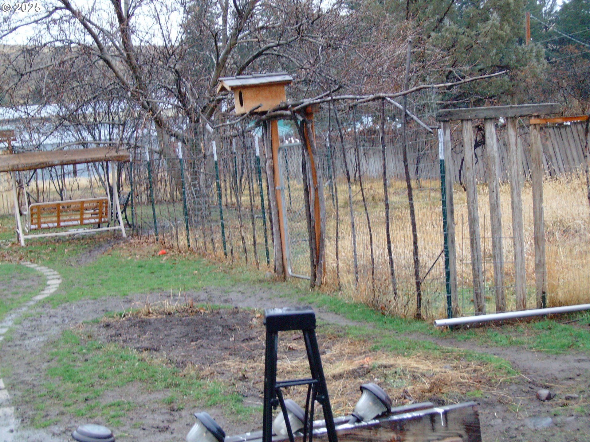 527 South Dewey Street Union, OR 97883 - Photo 3 of 21 a backyard of a house with a garden and barbeque