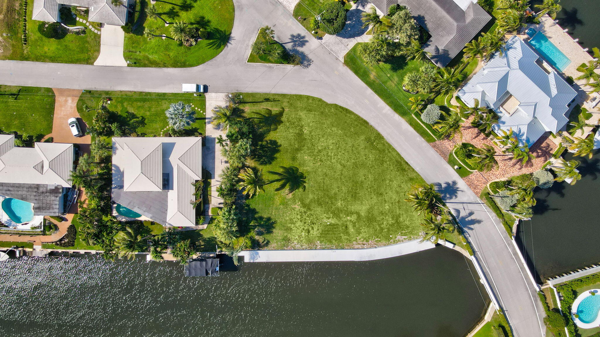 25 Sabal Island Drive Ocean Ridge, FL 33435 - Photo 12 of 16 an aerial view of a house with a garden and swimming pool