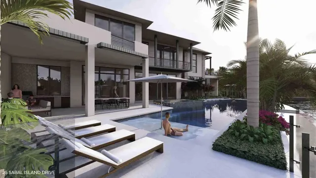 a view of a patio with swimming pool table and chairs