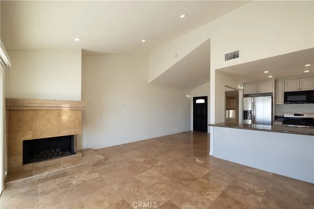 a view of a bathroom with a sink and mirror