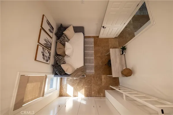 a bathroom with a mirror and vanity