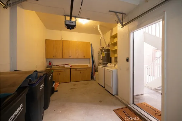 a view of a bathroom with a sink and mirror