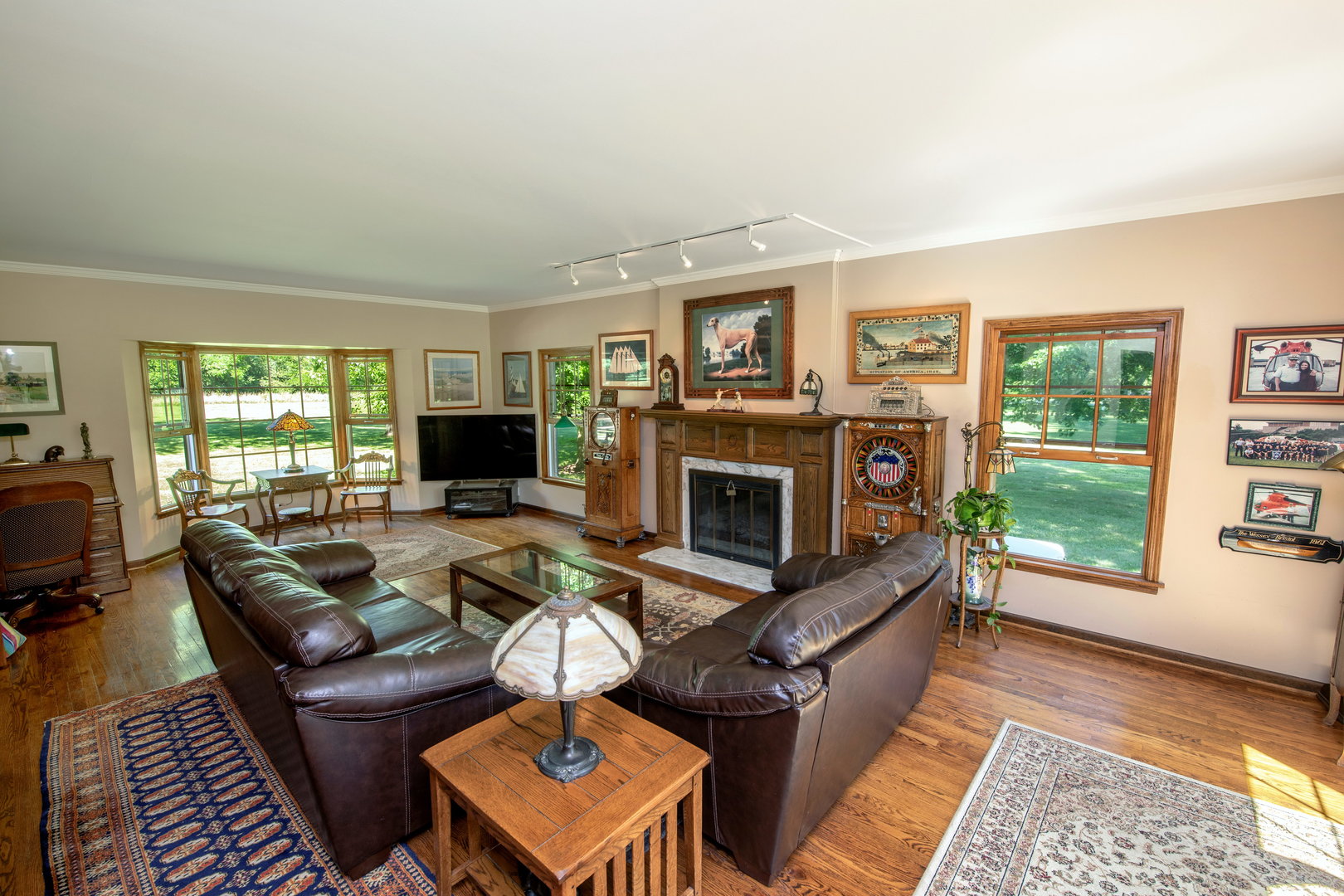 1 Cross Timber Road Barrington, IL 60010 - Photo 18 of 53 a living room with furniture a flat screen tv and a fireplace
