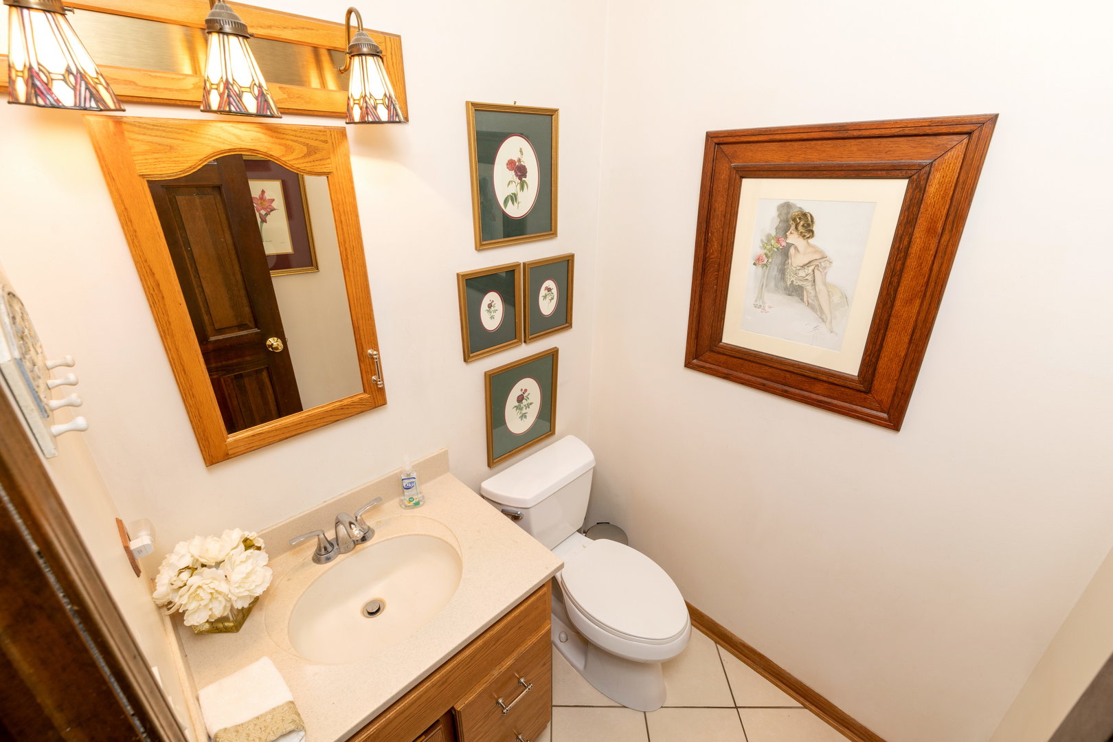 1 Cross Timber Road Barrington, IL 60010 - Photo 23 of 53 a bathroom with a toilet sink and mirror