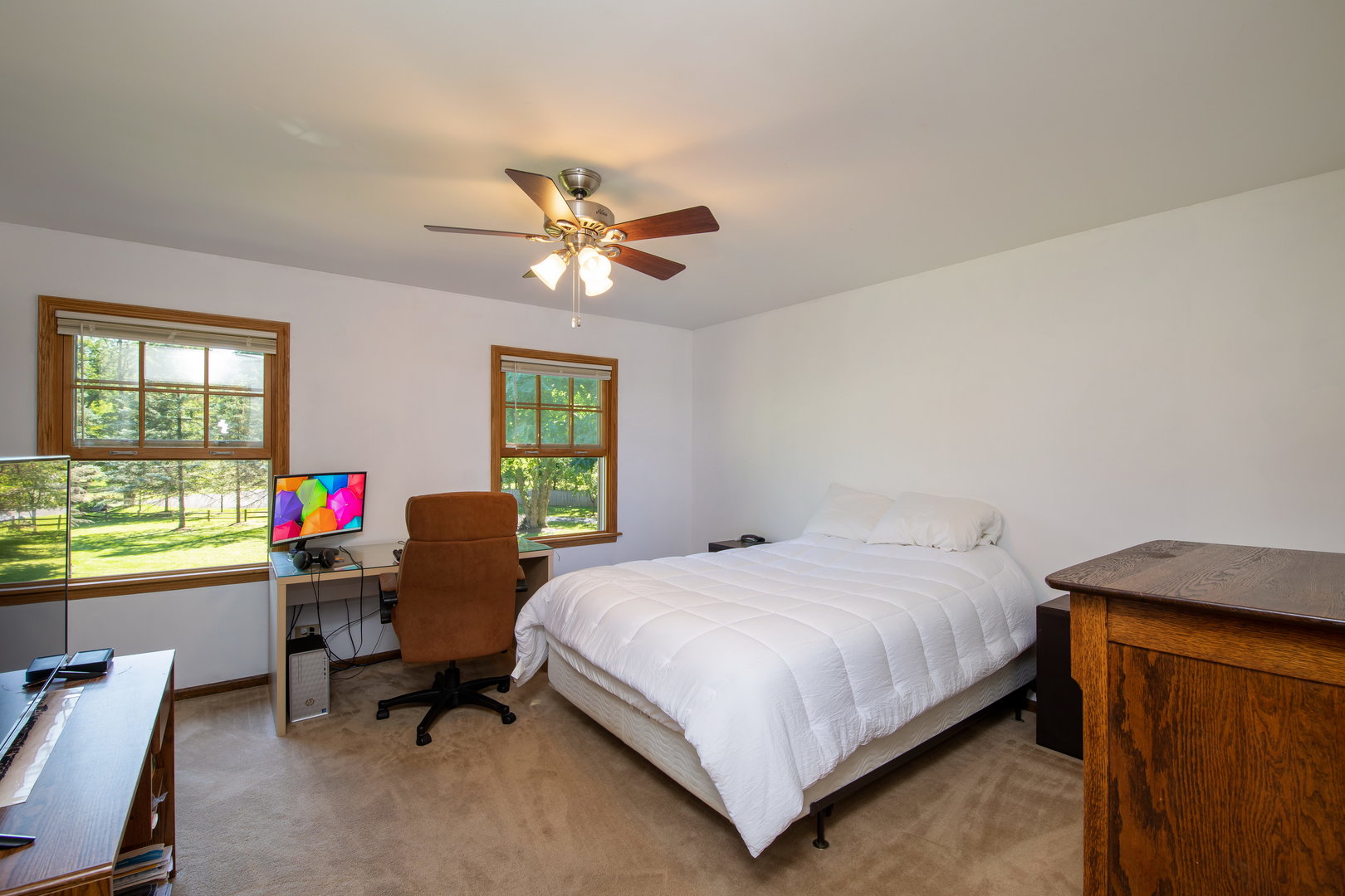 1 Cross Timber Road Barrington, IL 60010 - Photo 26 of 53 a bedroom with a bed and a chandelier