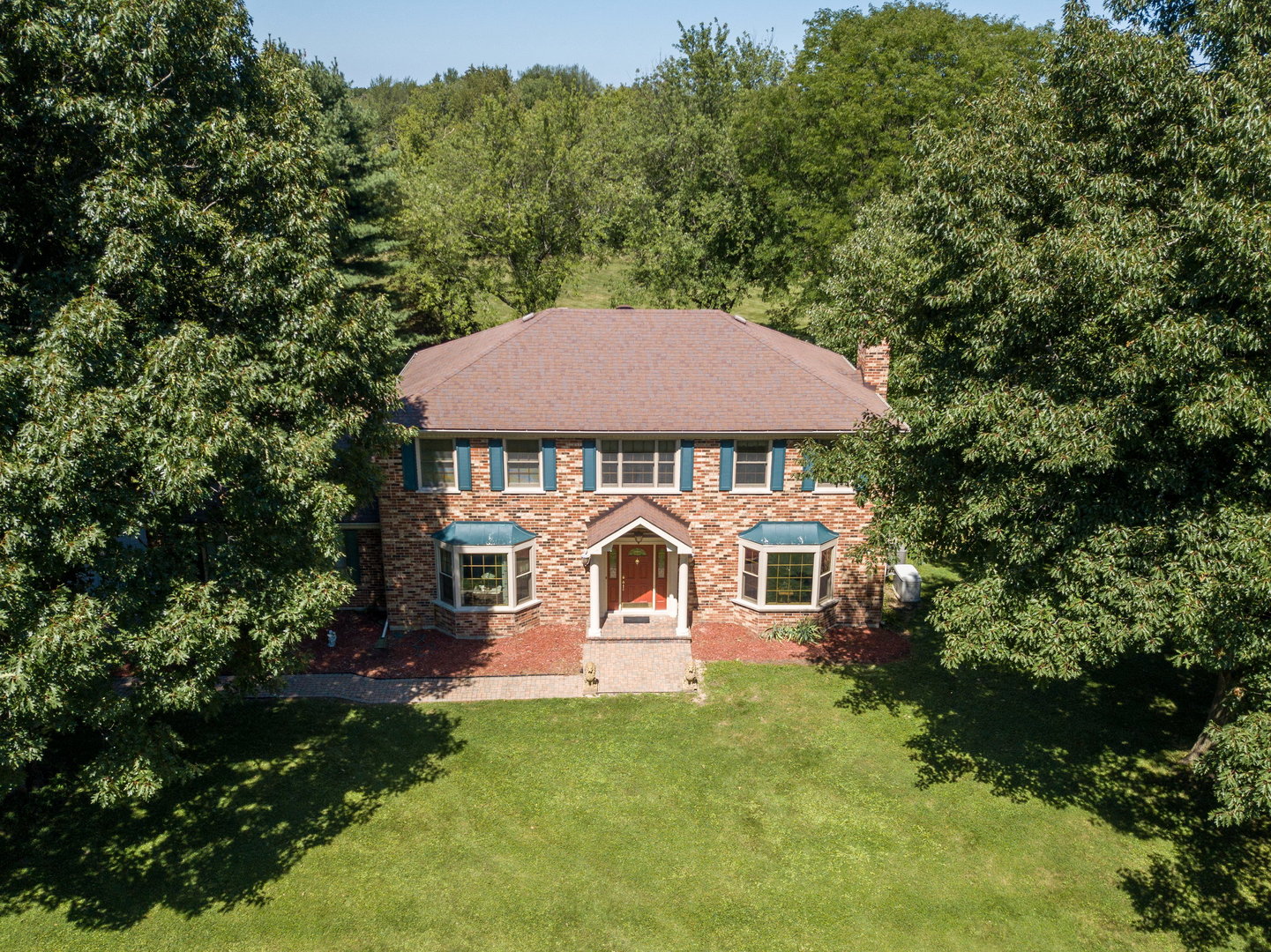 1 Cross Timber Road Barrington, IL 60010 - Photo 4 of 53 a front view of a house with a yard