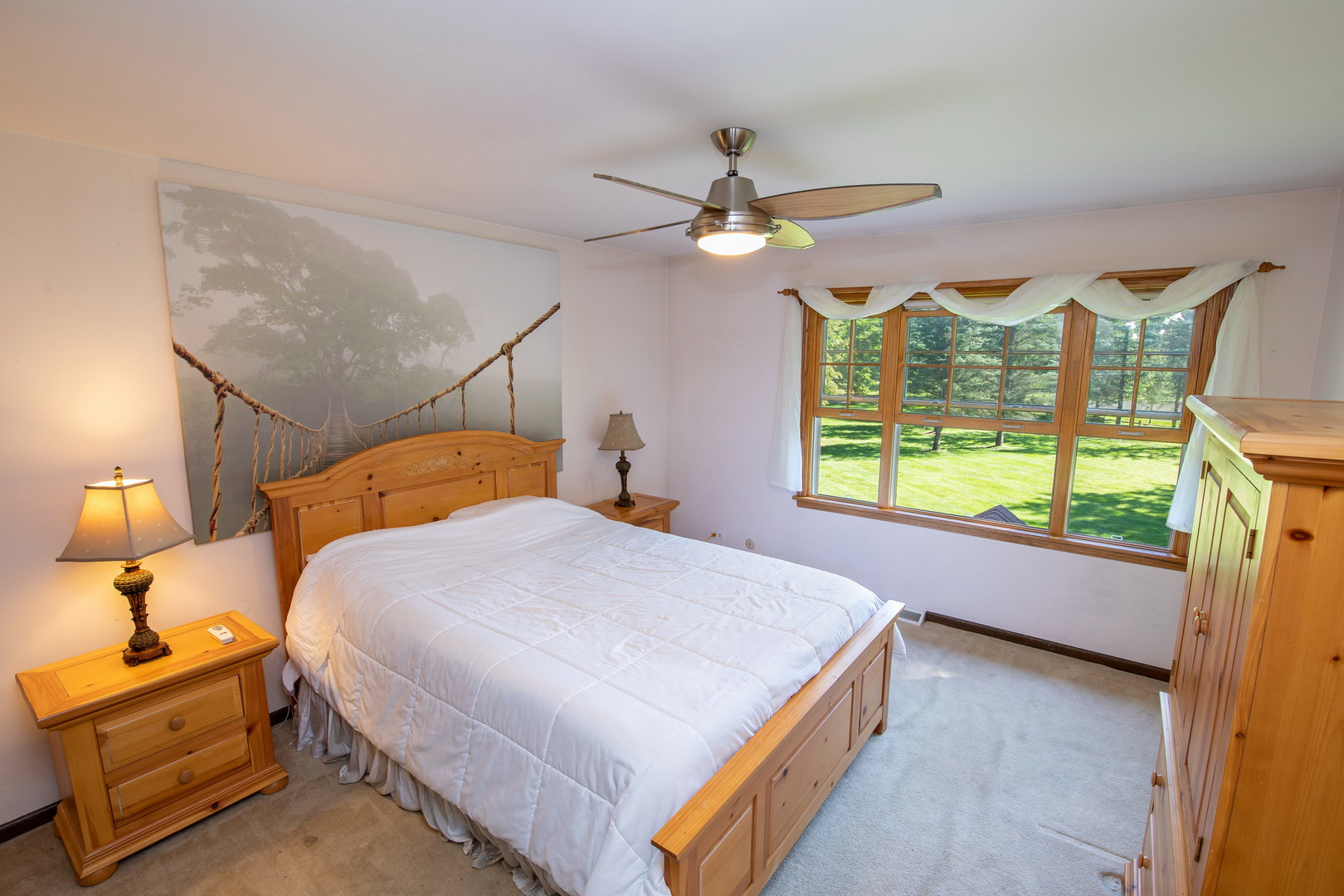 1 Cross Timber Road Barrington, IL 60010 - Photo 33 of 53 a bedroom with a large bed and a window