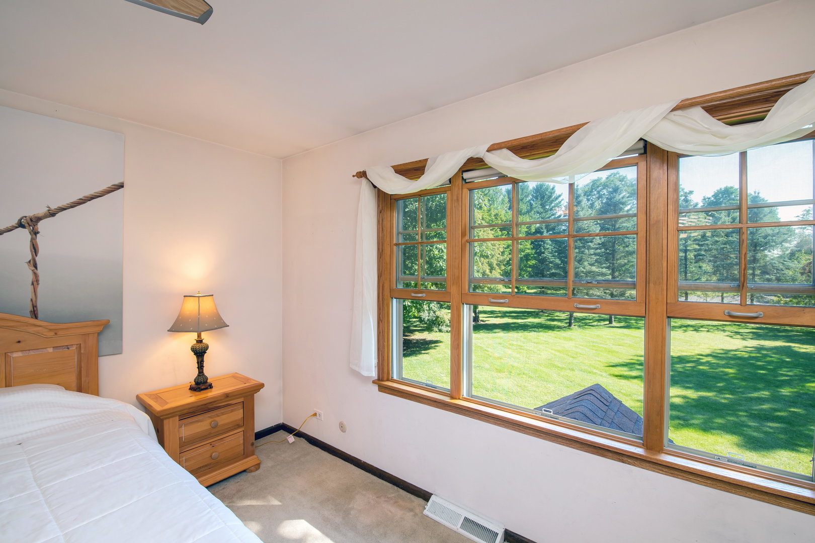 1 Cross Timber Road Barrington, IL 60010 - Photo 34 of 53 a bedroom with furniture and large windows