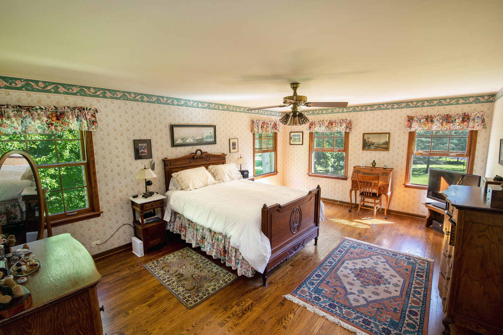 1 Cross Timber Road Barrington, IL 60010 - Photo 35 of 53 a spacious bedroom with a large bed couch and a window