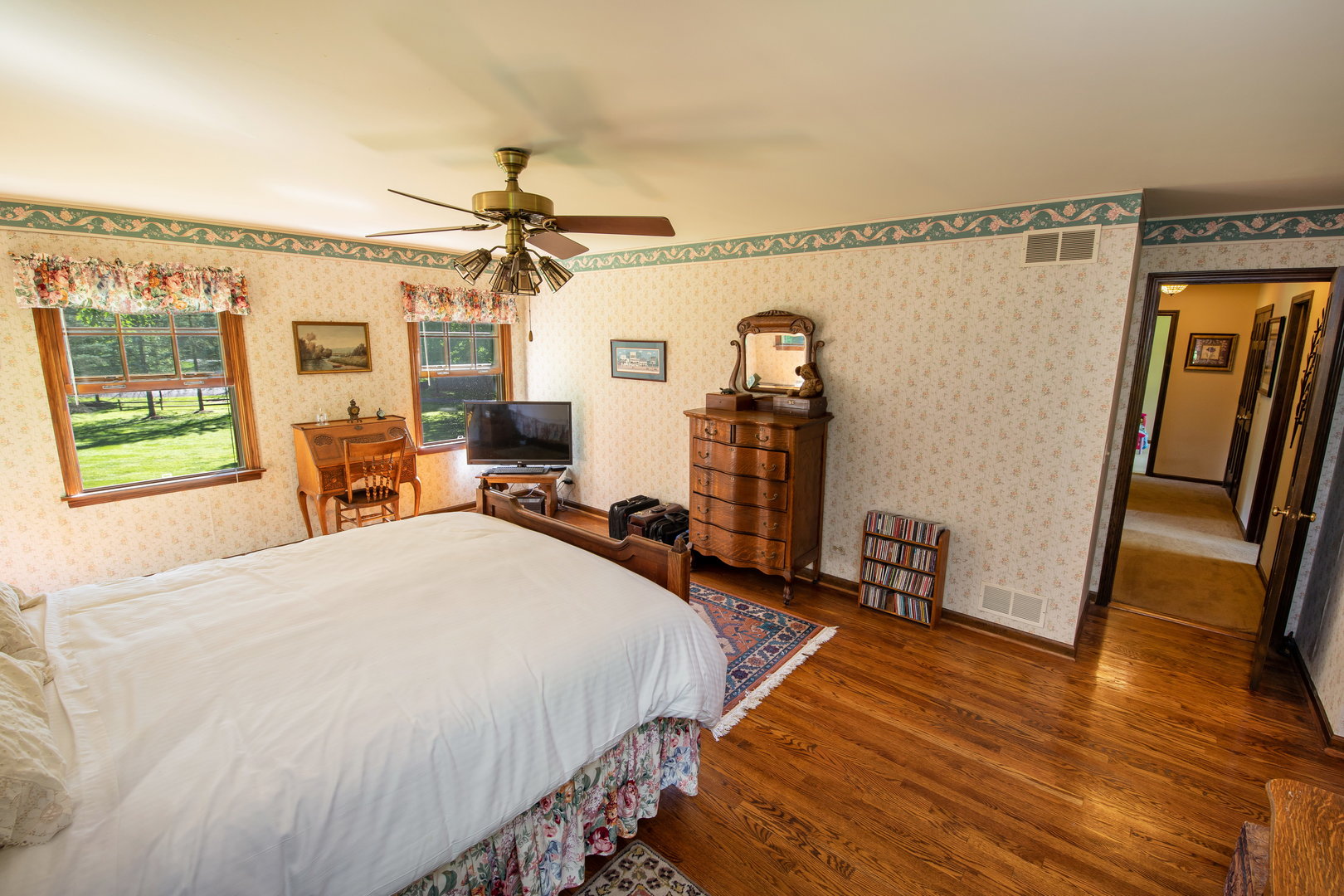 1 Cross Timber Road Barrington, IL 60010 - Photo 36 of 53 a bedroom with bed and wooden floor