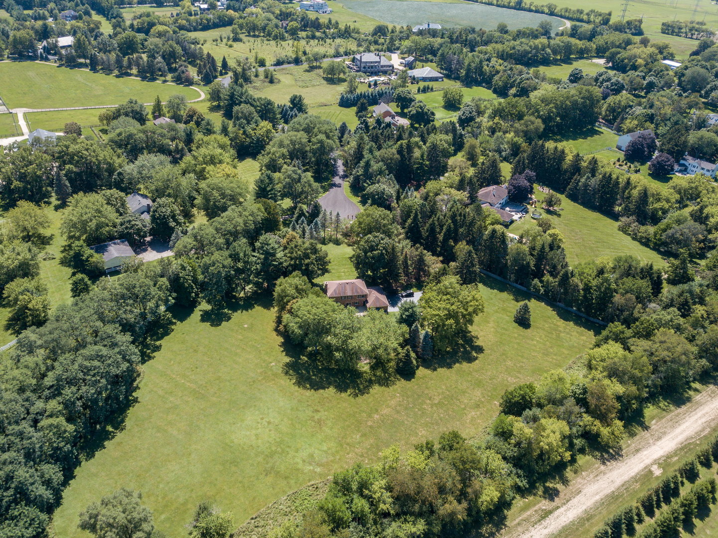 1 Cross Timber Road Barrington, IL 60010 - Photo 51 of 53 an aerial view of a houses with a yard and lake