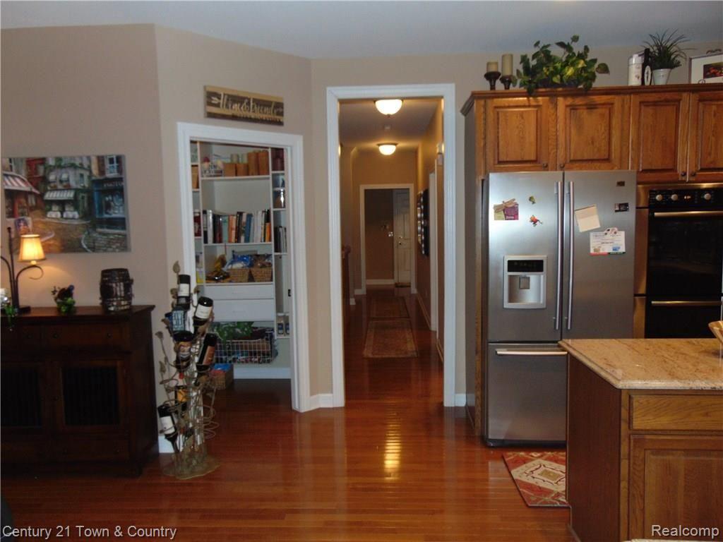 4731 Oakhurst Ridge Road Clarkston, MI 48348 - Photo 14 of 59 KITCHEN WITH VIEW OF THE WALK IN PANTRY AND HALLWAY TO THE GARAGE...