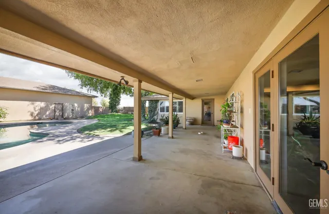 a view of a living room and bathroom