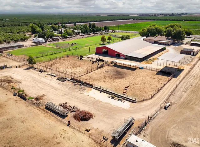 a view of a house with a yard porch and sitting area
