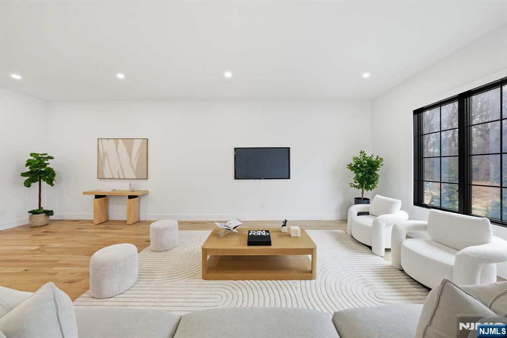 3 Cedar Court Demarest, NJ 07627 - Photo 11 of 49 a living room with furniture and a large window