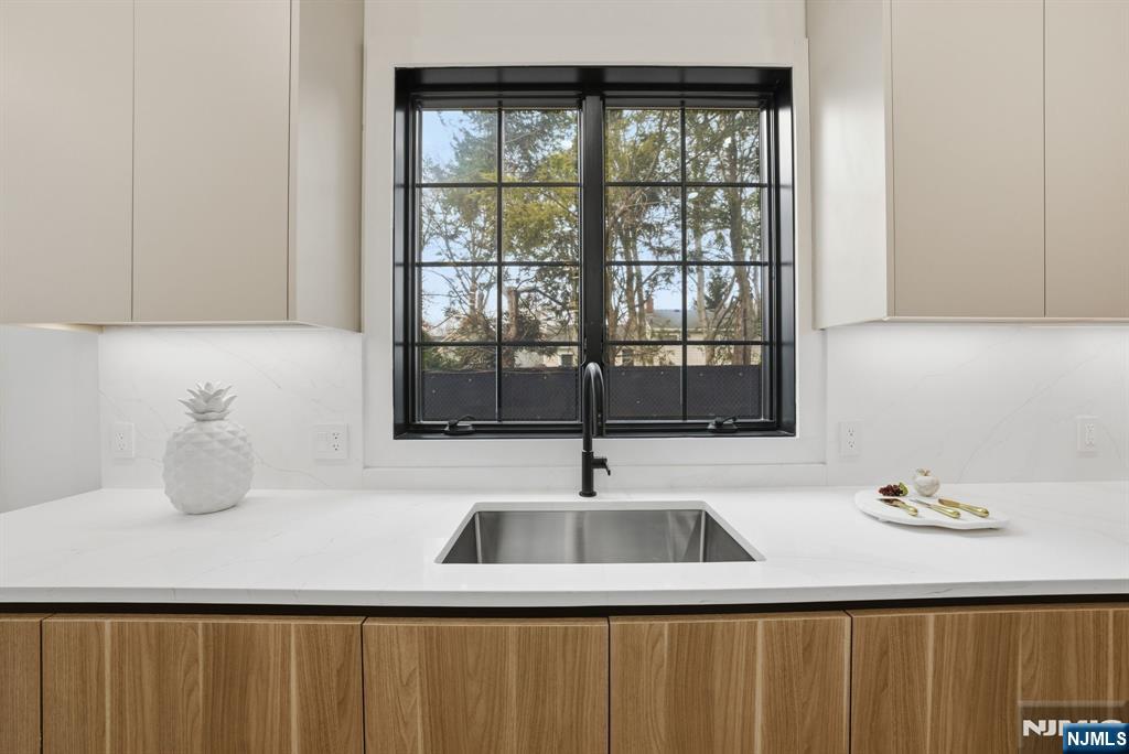 3 Cedar Court Demarest, NJ 07627 - Photo 26 of 49 a kitchen with a sink and a window