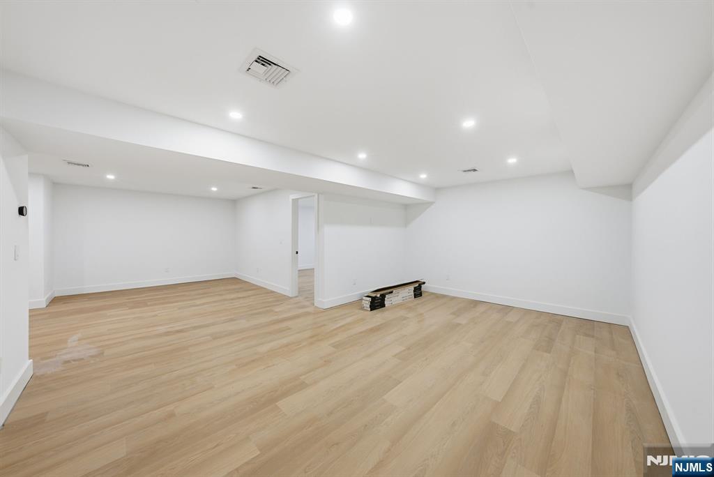 3 Cedar Court Demarest, NJ 07627 - Photo 44 of 49 wooden floor in an empty room with a window