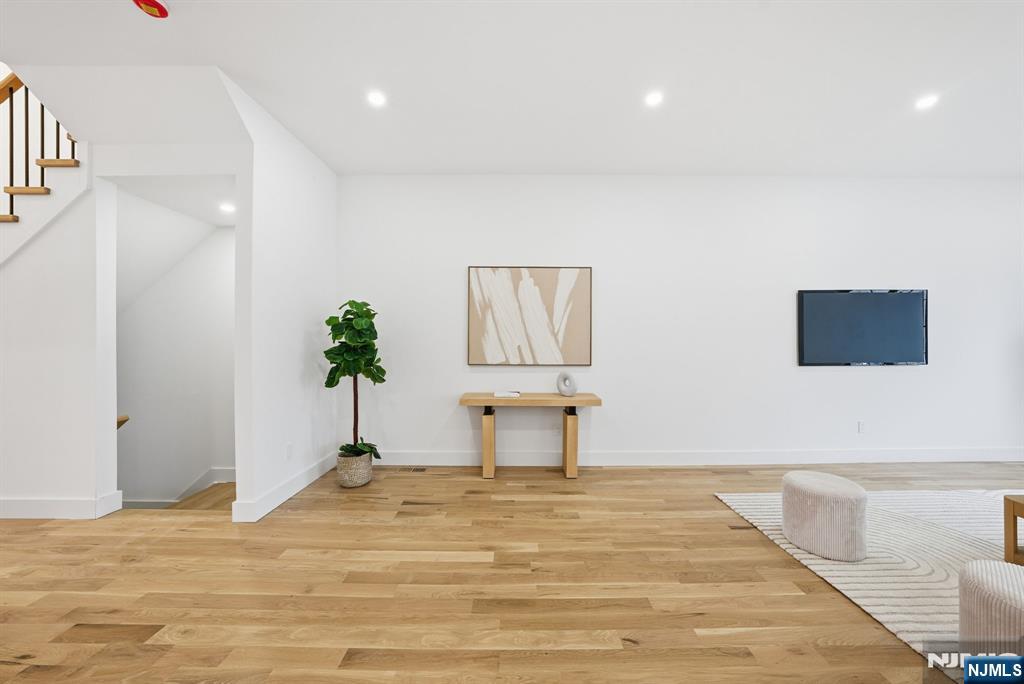 3 Cedar Court Demarest, NJ 07627 - Photo 8 of 49 a view of a room with wooden floor and cabinet