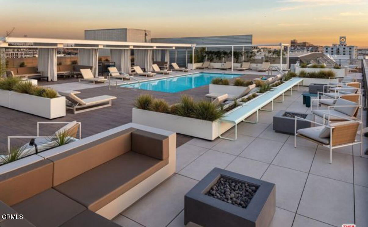 527 Molino Street, Unit 220 Los Angeles, CA 90013 - Photo 12 of 13 a view of a balcony with chairs