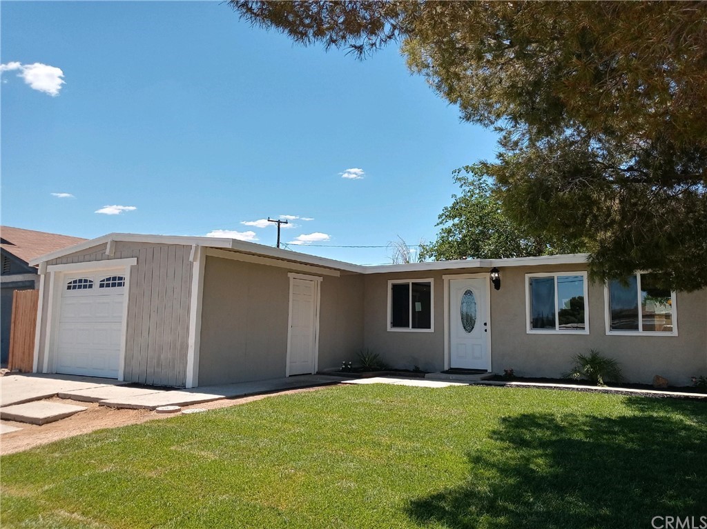 1115 South Ranger Street Ridgecrest, CA 93555 - Photo 1 of 1 a backyard of a house